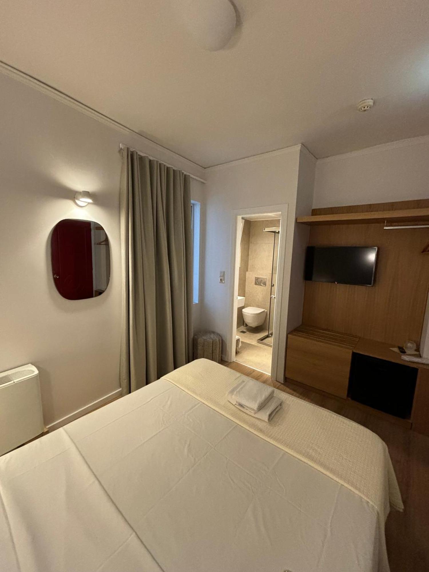 Hotel Maroussi Atenas Quarto foto