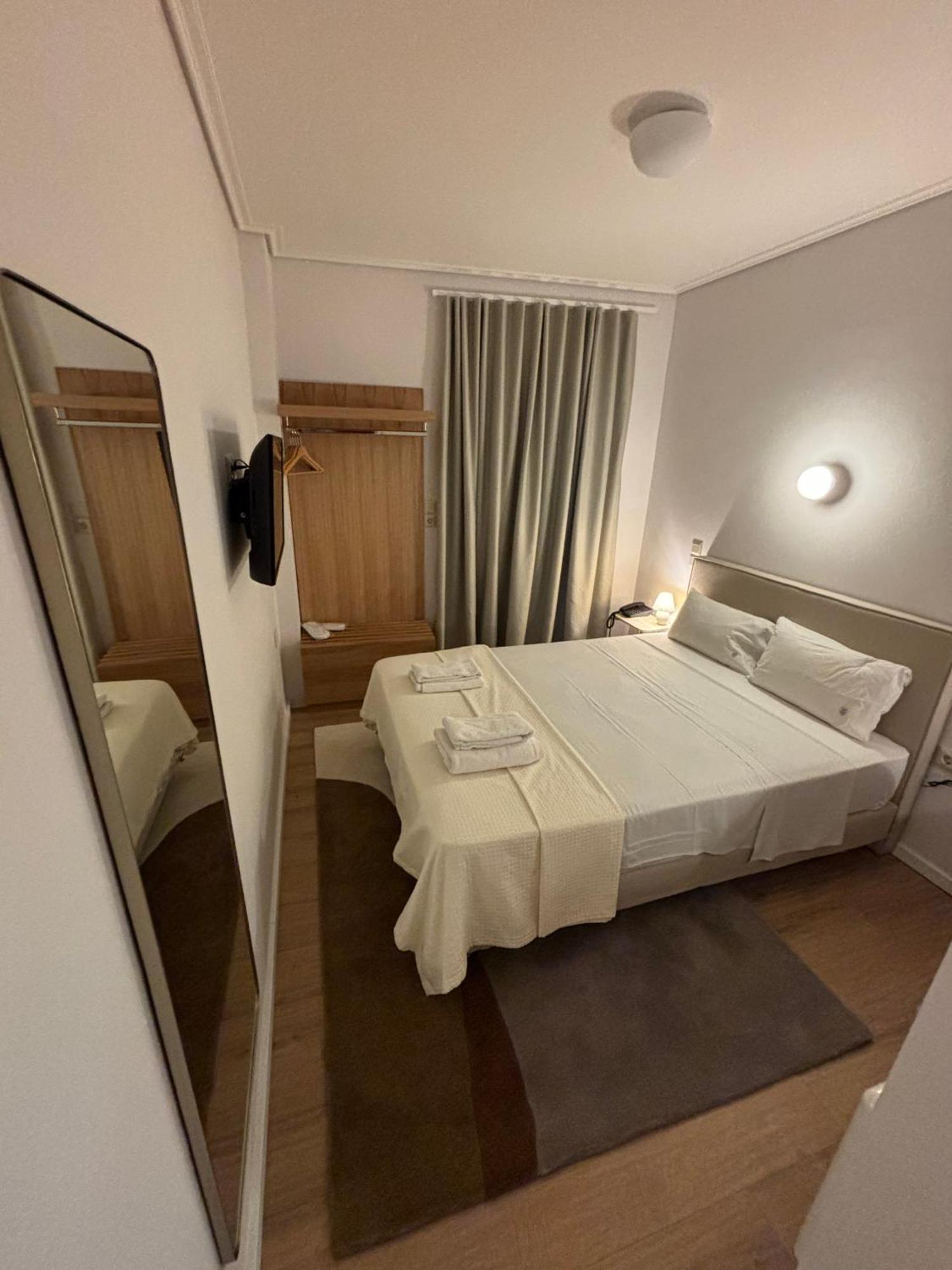 Hotel Maroussi Atenas Quarto foto