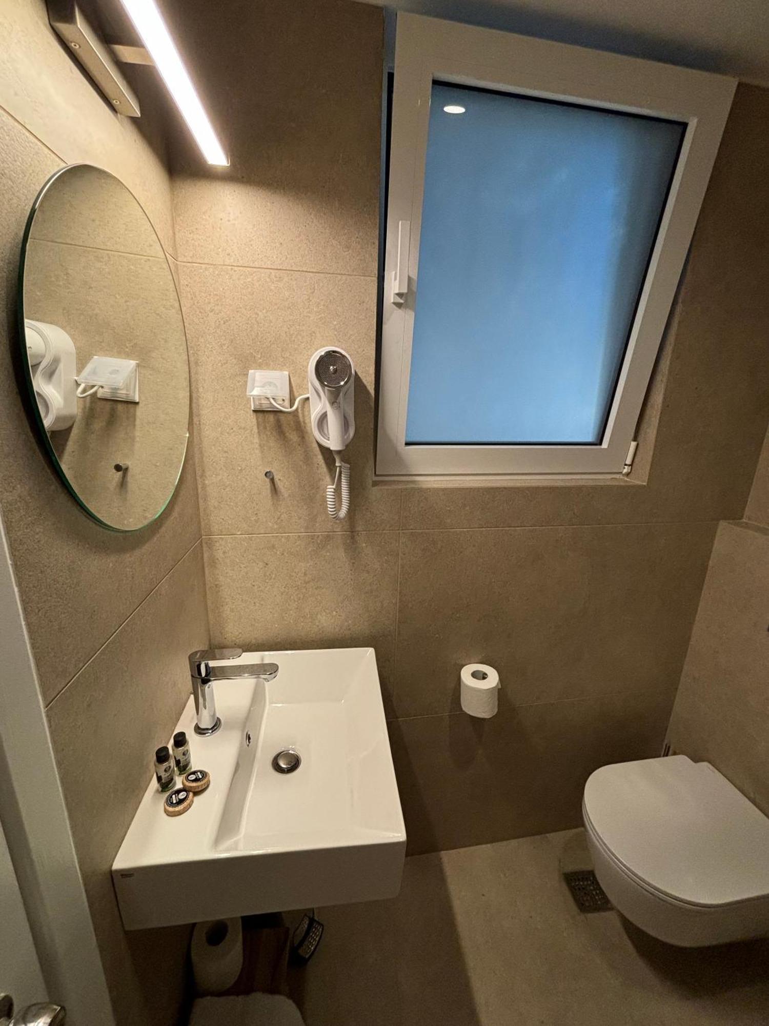 Hotel Maroussi Atenas Quarto foto